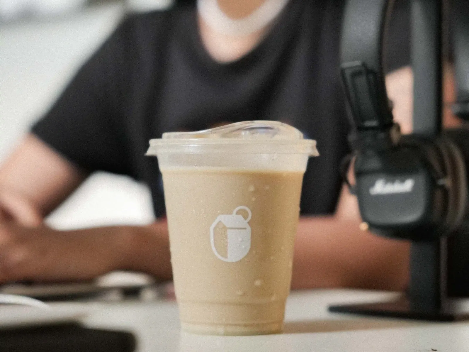 Balakosa Coffee cup with branded logo on a table